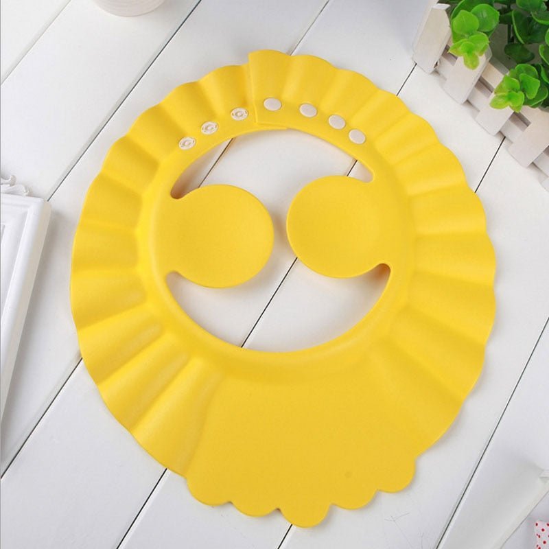 Visière chapeau pour douche bébé I ShampooCap™ - Boudchou de maman